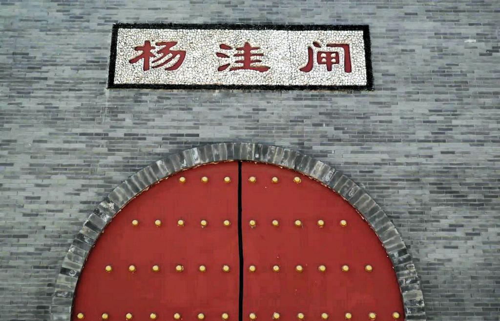 բ